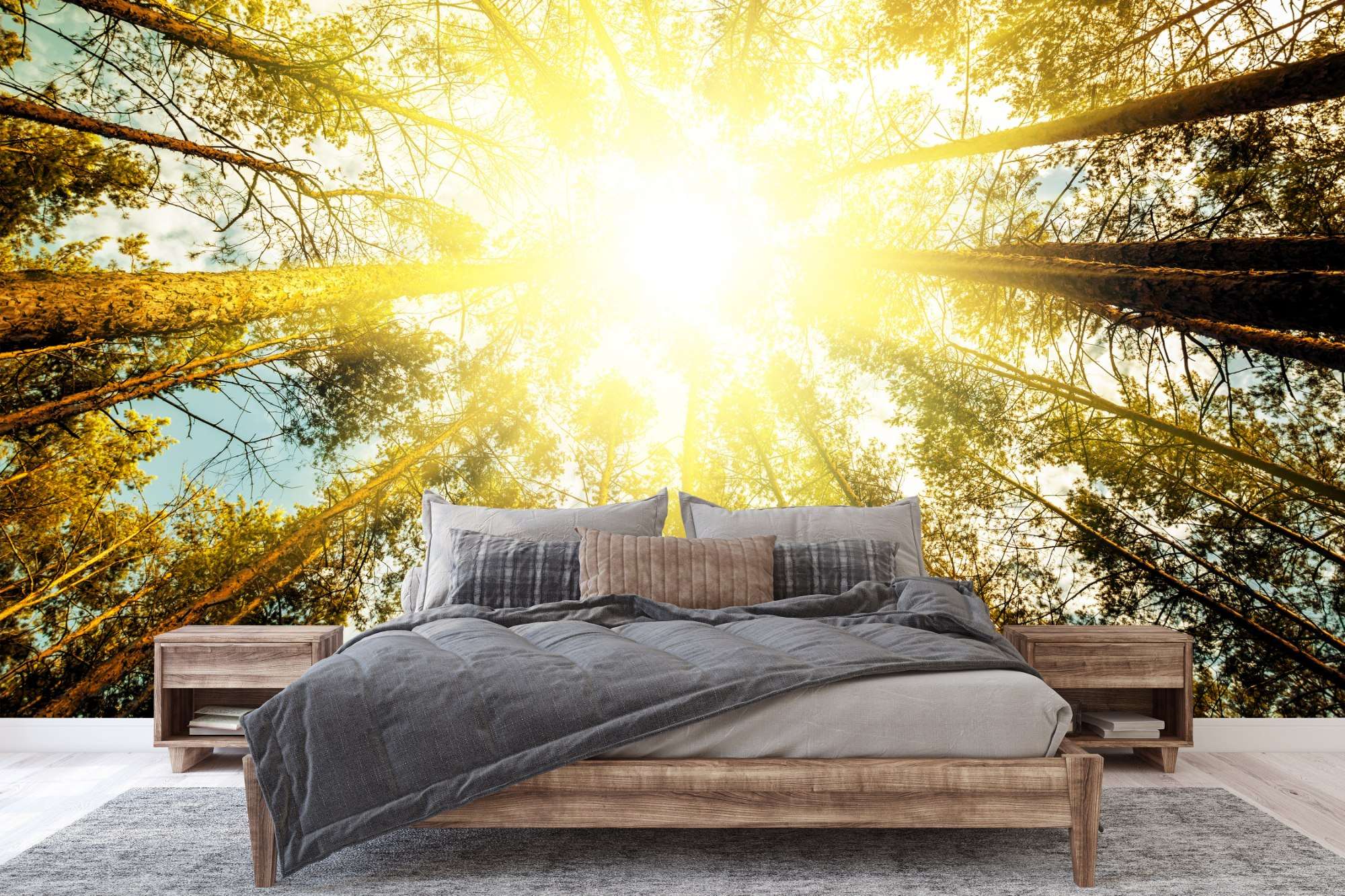 Fotobehang Zonnestralen door Hoge Bomen